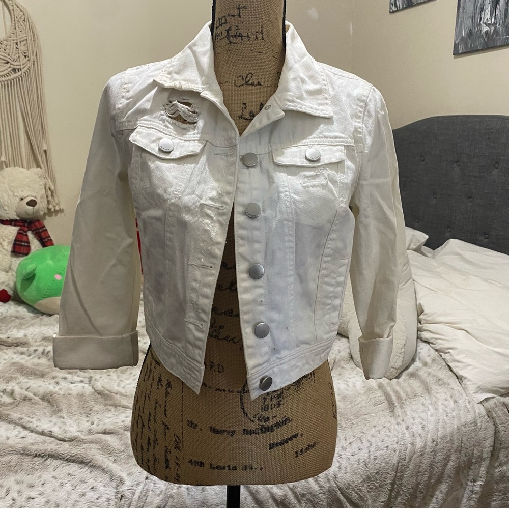 Distressed white jean jacket